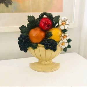 Vintage cast iron painted stamped bouquet doorstop